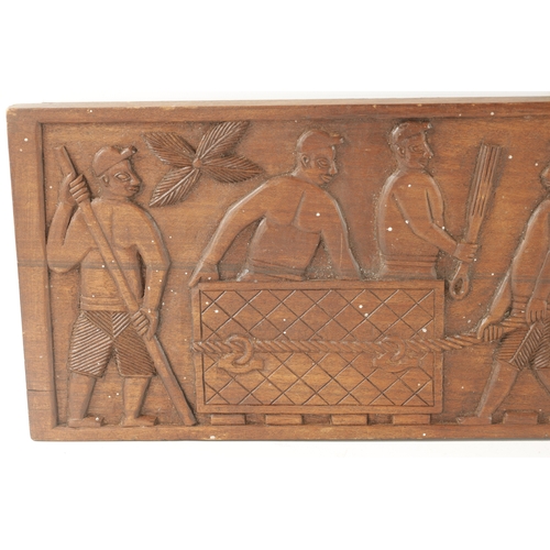 416 - A CAMEROON CARVED HARDWOOD PLAQUE OF SLAVES (94cm wide 21cm high)