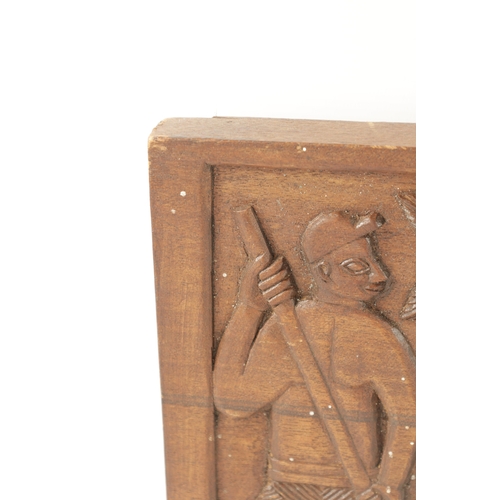 416 - A CAMEROON CARVED HARDWOOD PLAQUE OF SLAVES (94cm wide 21cm high)