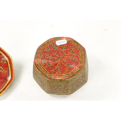 417 - AN ANTIQUE KASHMIRE PAINTED OCTAGONAL BOX with turned bone finial (13cm wide 10cm high)