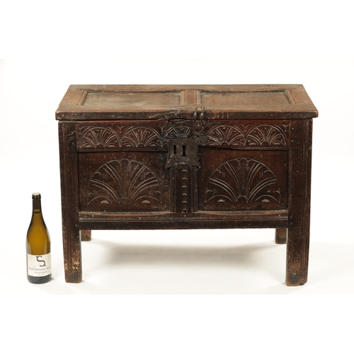 418 - A GOOD SMALL LATE 17TH CENTURY OAK PANELLED COFFER with arcaded carved front (82cm wide 45cm deep 57... 