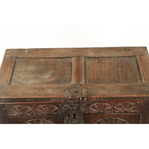 418 - A GOOD SMALL LATE 17TH CENTURY OAK PANELLED COFFER with arcaded carved front (82cm wide 45cm deep 57... 