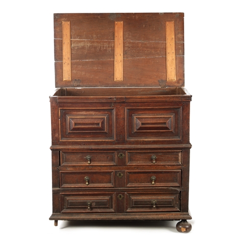 428 - AN UNUSUAL 17TH CENTURY JACOBEAN MOULDED FRONT OAK CHEST OF DRAWERS with hinged top above three moul... 