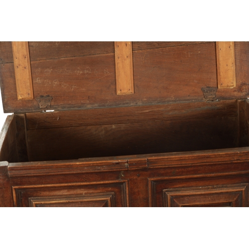 428 - AN UNUSUAL 17TH CENTURY JACOBEAN MOULDED FRONT OAK CHEST OF DRAWERS with hinged top above three moul... 