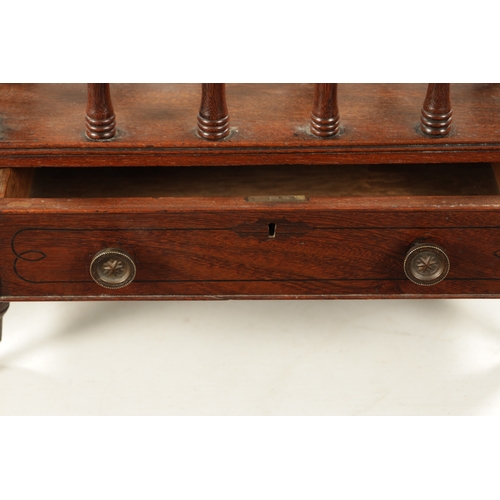 430 - A REGENCY COLONIAL HARDWOOD CANTERBURY with turned spindles and three divisions; above a frieze draw... 