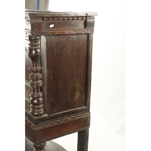 433 - A 17TH CENTURY OAK BUFFET with moulded fronts and ring turned supports above an open bottom shelf (1... 