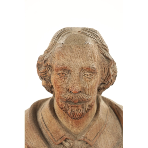 435 - A LATE 19TH CENTURY CARVED WOODEN BUST OF SHAKESPEARE (41cm high)