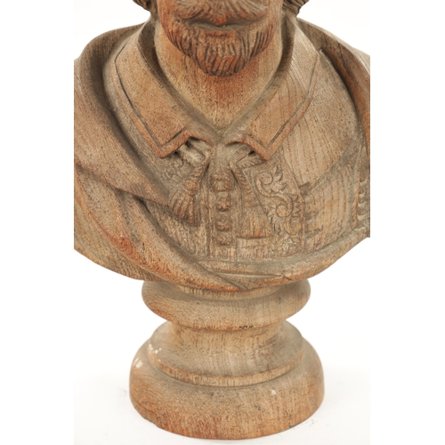 435 - A LATE 19TH CENTURY CARVED WOODEN BUST OF SHAKESPEARE (41cm high)