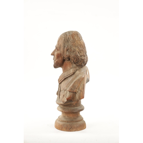 435 - A LATE 19TH CENTURY CARVED WOODEN BUST OF SHAKESPEARE (41cm high)