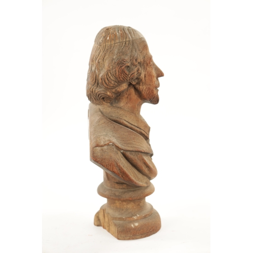 435 - A LATE 19TH CENTURY CARVED WOODEN BUST OF SHAKESPEARE (41cm high)