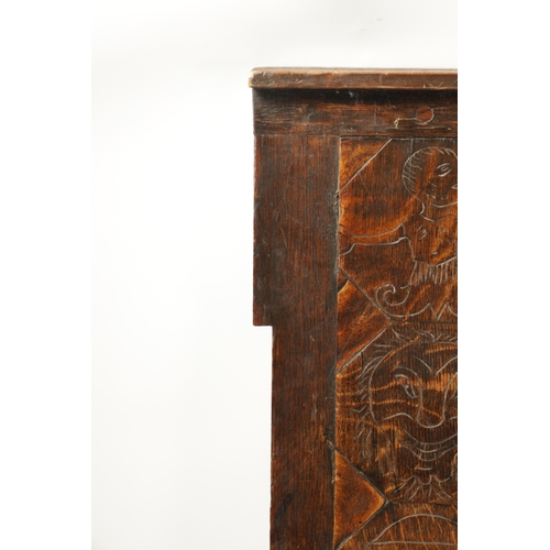 437 - AN UNUSUAL FOLK ART CARVED PANEL depicitng various animals and faces (74cm deep 213cm long)