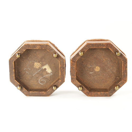 439 - A PAIR OF REGENCY 'BULLOCK' INSPIRED PENWORK UPHOLSTERED FOOTSTOOLS of octagonal form on brass ball ... 