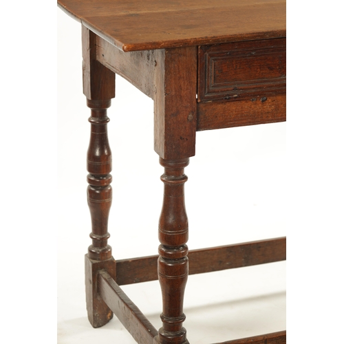 448 - A LATE 17TH CENTURY ELM SIDE TABLE with moulded top drawer; raised on ring turned legs joined by und... 