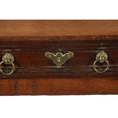 448 - A LATE 17TH CENTURY ELM SIDE TABLE with moulded top drawer; raised on ring turned legs joined by und... 