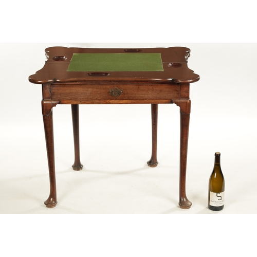 452 - A GEORGE II FIGURED MAHOGANY TRIPLE TOP FOLD-OVER GAMES TABLE with outset corners comprising a tea t... 