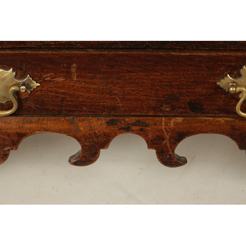 47 - A MID 18TH CENTURY OAK WELSH COFFER BACH the lift off top above three arcaded panels to the front wi... 