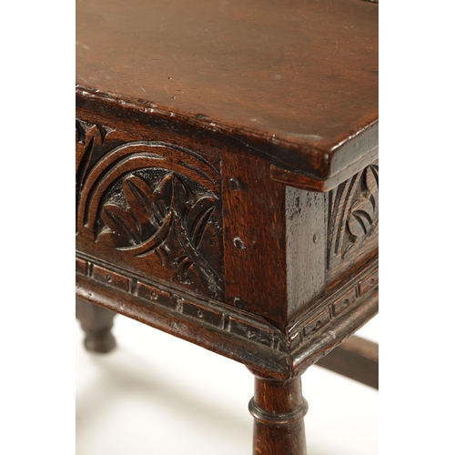 48 - A RARE 17TH CENTURY JOINED OAK BOX TOP SIDE TABLE the hinged top above a leaf carved arcaded frieze;... 