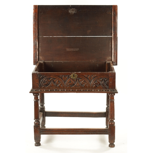 48 - A RARE 17TH CENTURY JOINED OAK BOX TOP SIDE TABLE the hinged top above a leaf carved arcaded frieze;... 