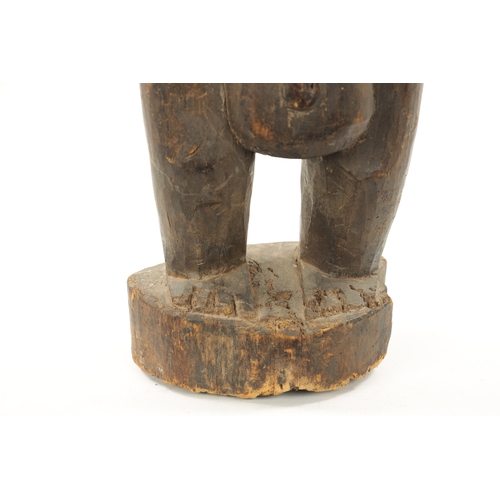 54 - AN ANTIQUE NIGERIAN MALE FERTILITY FIGURE from the Eric Mayes Collection (87cm high)