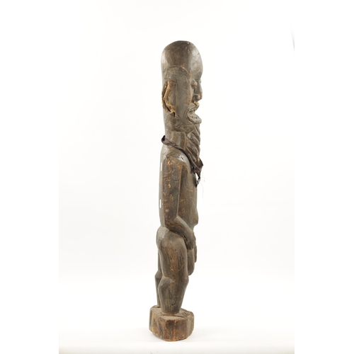 54 - AN ANTIQUE NIGERIAN MALE FERTILITY FIGURE from the Eric Mayes Collection (87cm high)