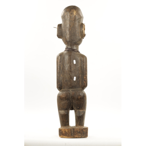 54 - AN ANTIQUE NIGERIAN MALE FERTILITY FIGURE from the Eric Mayes Collection (87cm high)