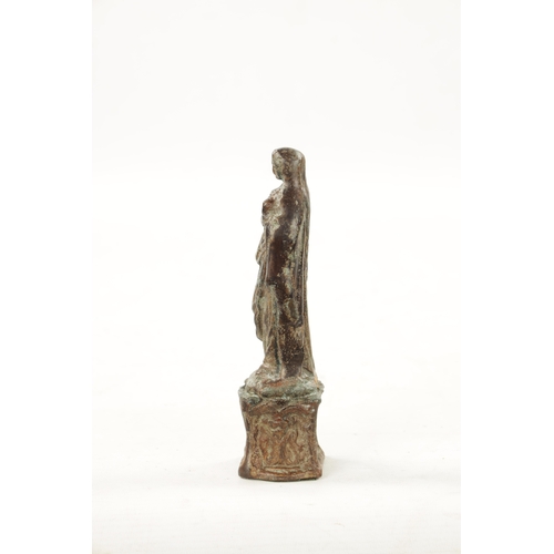 59 - AN EARLY CAST BRONZE SCULPTURE modelled as Madonna (18cm high)