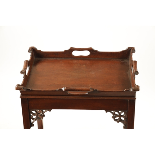 6 - A REPRODUCTION CHIPPENDALE STYLE MAHOGANY TRAY ON STAND (58cm wide 46cm deep 68cm high)