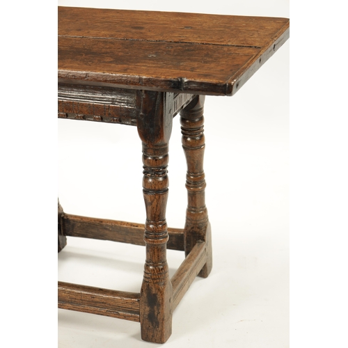 72 - A RARE 17TH CENTURY JOINED OAK TAVERN STOOL/TABLE with overhanging plank top above a ring turned bas... 