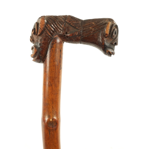 77 - A RARE TWO HEADED GROTESQUE 19TH CENTURY AFRICAN WALKING STICK (89cm overall)