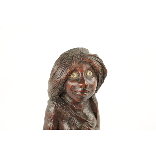 78 - AN UNUSUAL 19TH CENTURY FOLK ARK CARVED WALNUT FIGURE OF A MYTHICAL FEMALE with bone inlaid eyes (26... 