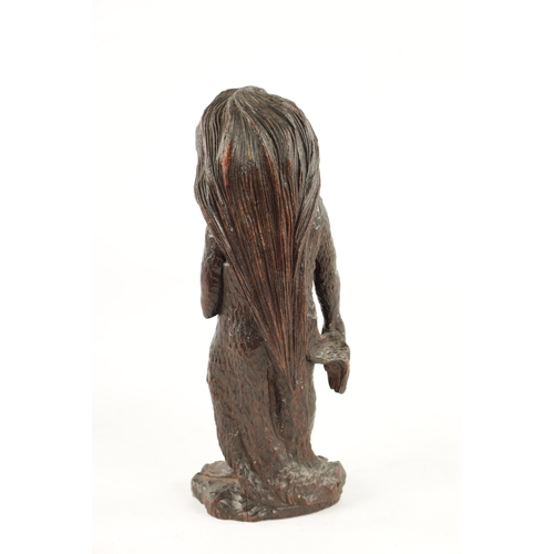 78 - AN UNUSUAL 19TH CENTURY FOLK ARK CARVED WALNUT FIGURE OF A MYTHICAL FEMALE with bone inlaid eyes (26... 