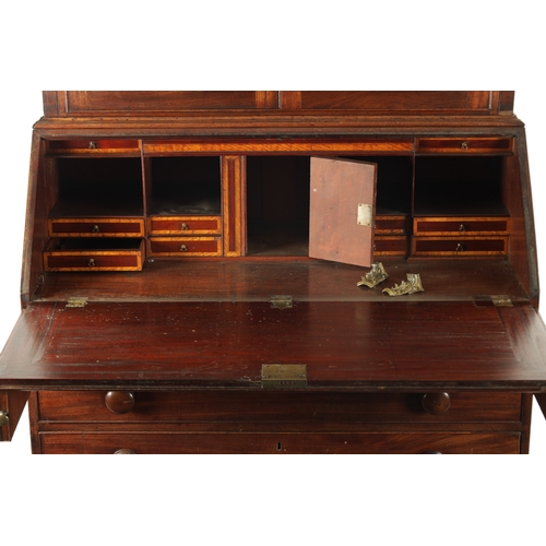 81 - A GEORGE III MAHOGANY BUREAU BOOKCASE with glazed top flanked by quarter columns above an angled fal... 