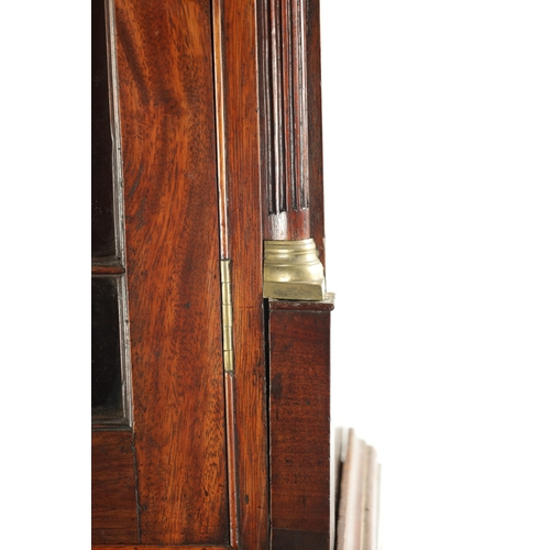 81 - A GEORGE III MAHOGANY BUREAU BOOKCASE with glazed top flanked by quarter columns above an angled fal... 