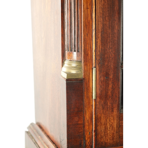 81 - A GEORGE III MAHOGANY BUREAU BOOKCASE with glazed top flanked by quarter columns above an angled fal... 