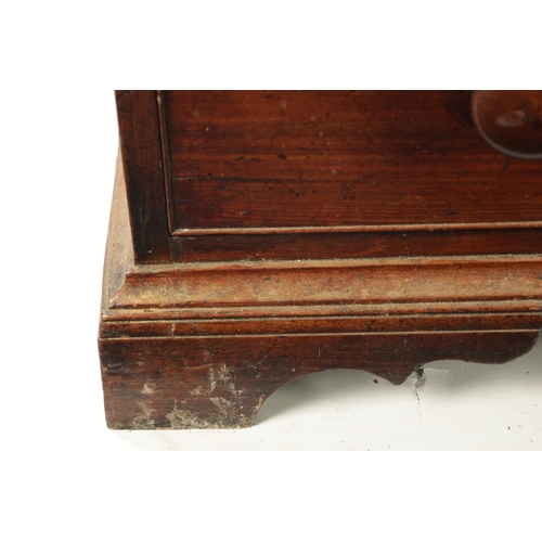 81 - A GEORGE III MAHOGANY BUREAU BOOKCASE with glazed top flanked by quarter columns above an angled fal... 