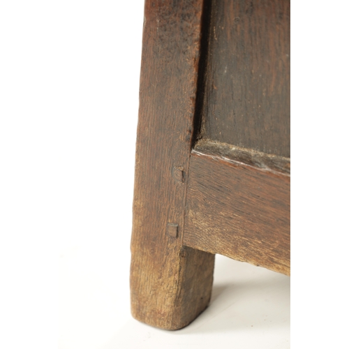 84 - A 17TH CENTURY OAK BOX STOOL of tapering form with panlled sides. (51cm high 34cm sqaure at base)