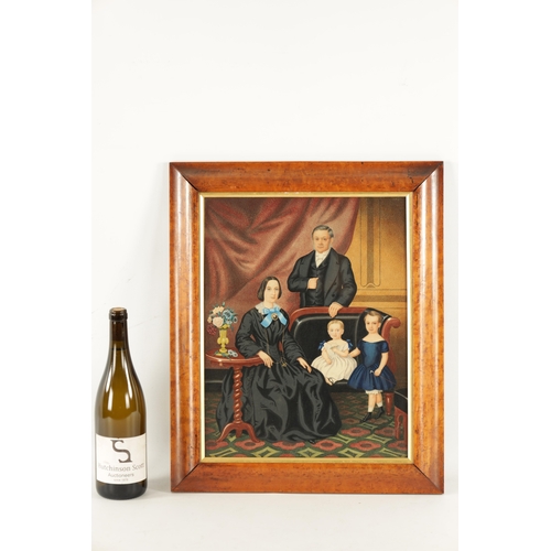 9 - A 19TH CENTURY WATER COLOUR DEPICTING A FAMILY PORTRAIT having label to reverse - in maple glazed fr... 