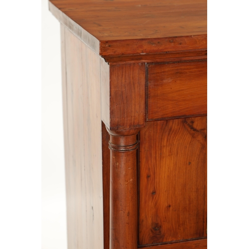 90 - AN 18TH CENTURY EMPIRE STYLE YEW-WOOD BEDSIDE CABINET with cupboard centre and outset columns (41cm ... 