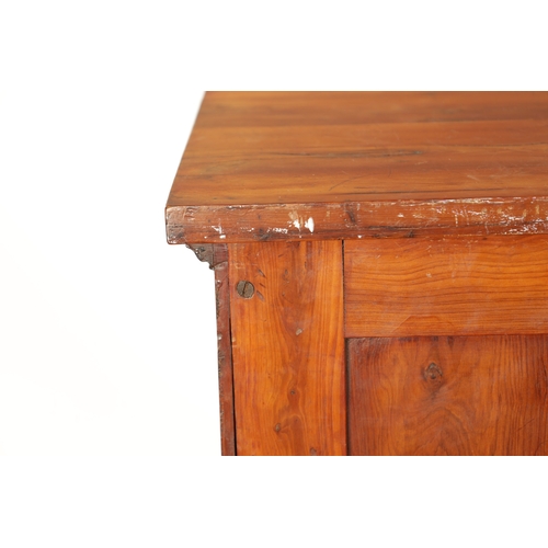 90 - AN 18TH CENTURY EMPIRE STYLE YEW-WOOD BEDSIDE CABINET with cupboard centre and outset columns (41cm ... 