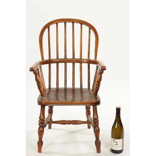 91 - A 19TH CENTURY CHILD'S STICK-BACK WINDSOR CHAIR having elm seat and ring-turned legs (77cm high 47cm... 