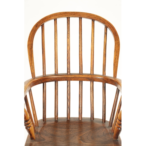 91 - A 19TH CENTURY CHILD'S STICK-BACK WINDSOR CHAIR having elm seat and ring-turned legs (77cm high 47cm... 