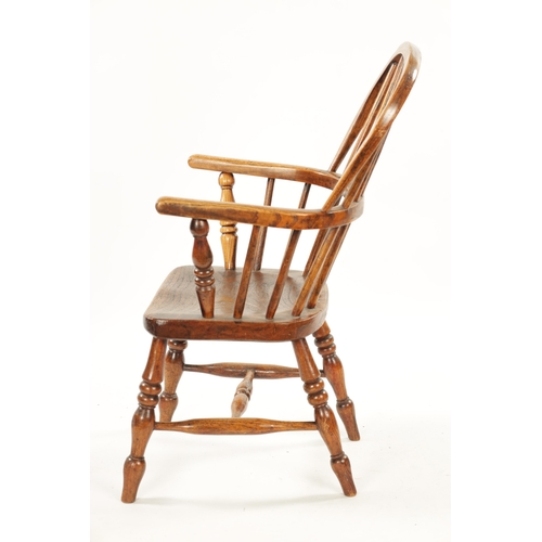 91 - A 19TH CENTURY CHILD'S STICK-BACK WINDSOR CHAIR having elm seat and ring-turned legs (77cm high 47cm... 