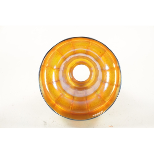 459 - AN EARLY 20TH CENTURY IRIDESCENT GLASS SHADE of tapering bel form with reeded body (17cm diameter 15... 