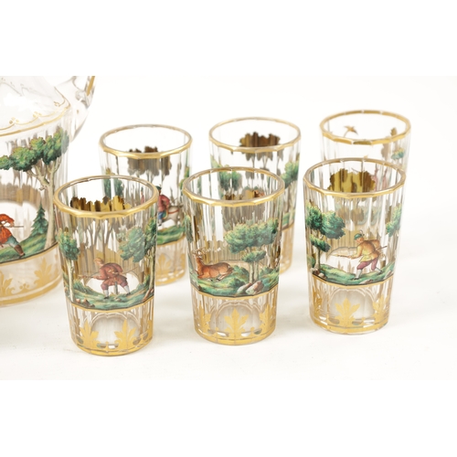 460 - A LATE 19TH CENTURY BOHEMIAN GLASS AND ENAMEL DRINKS SET the jug of faceted form, gilt rim and decor... 