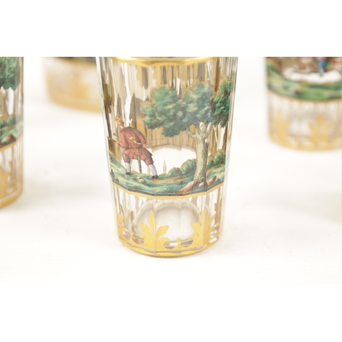 460 - A LATE 19TH CENTURY BOHEMIAN GLASS AND ENAMEL DRINKS SET the jug of faceted form, gilt rim and decor... 