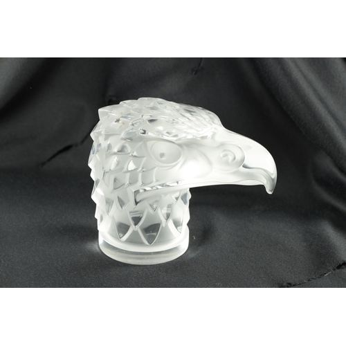 462 - A RENE LALIQUE 'TETE D'AIGLE' CLEAR AND FROSTED GLASS CAR MASCOT on a circular base moulded signatur... 