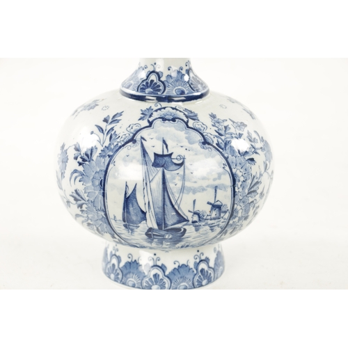 464 - A 19TH CENTURY BLUE AND WHITE DELFT BOTTLE VASE decorated with dutch scenes and floral sprays (29cm ... 