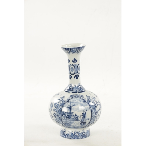 464 - A 19TH CENTURY BLUE AND WHITE DELFT BOTTLE VASE decorated with dutch scenes and floral sprays (29cm ... 