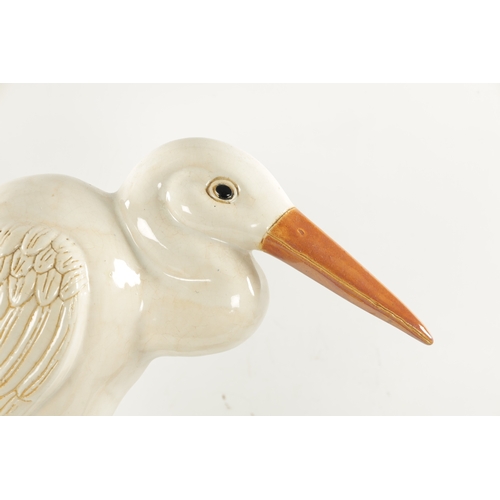 475 - A LATE 19TH CENTURY MAJOLICA SCULPTURE OF A STORK (64cm high)