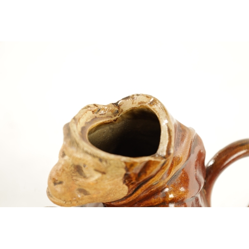 476 - A 19TH CENTURY POTTERY MONKEY PITCHER JUG in the style of Bodlet Vaudancourt, modelled as a clothed ... 