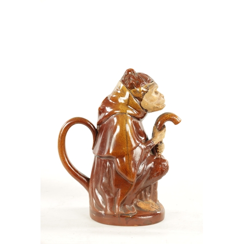 476 - A 19TH CENTURY POTTERY MONKEY PITCHER JUG in the style of Bodlet Vaudancourt, modelled as a clothed ... 